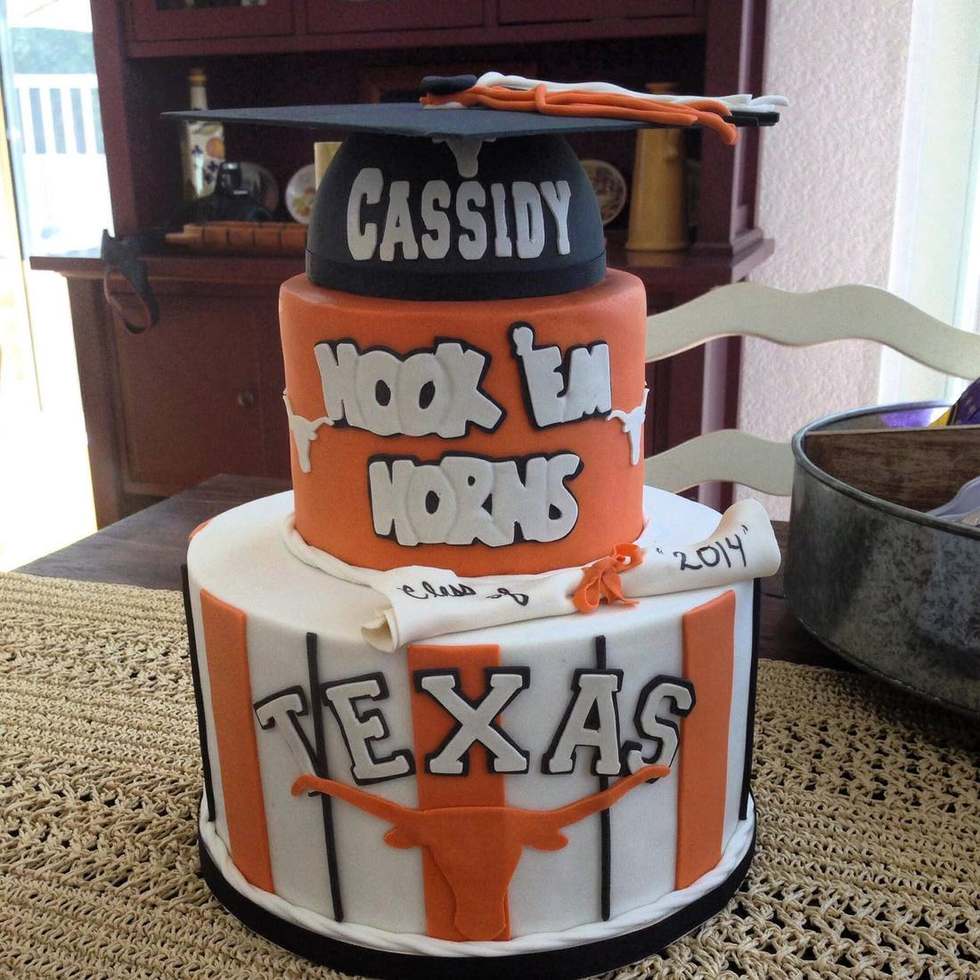Texas Longhorns themed graduation cake with cap topper