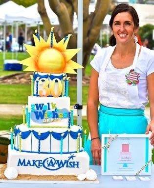 Sun themed tiered cake made for a Make-A-Wish charity event