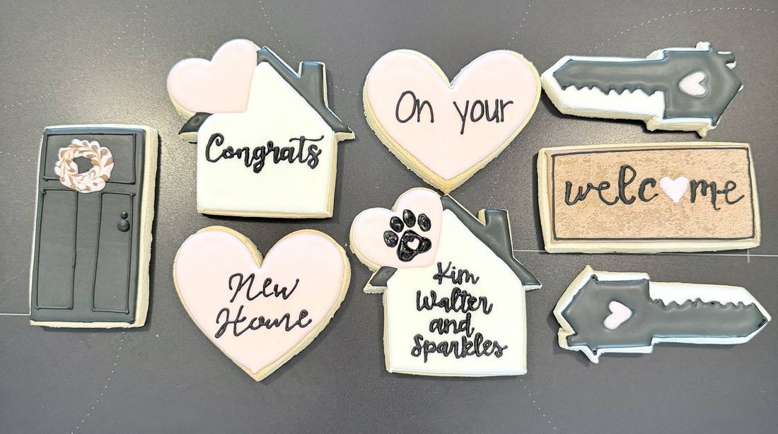Housewarming cookies with keys, door, and welcome mat