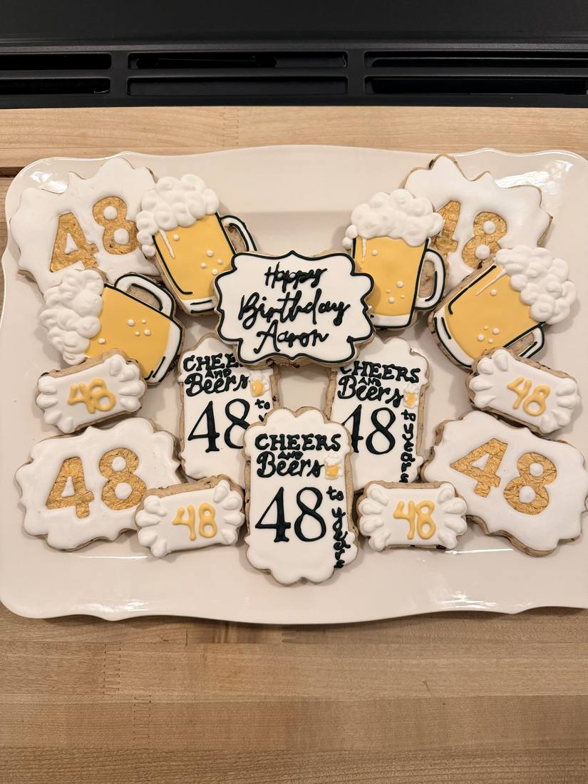 Cheers and Beers 48th birthday cookie platter with beer mugs and gold numbers